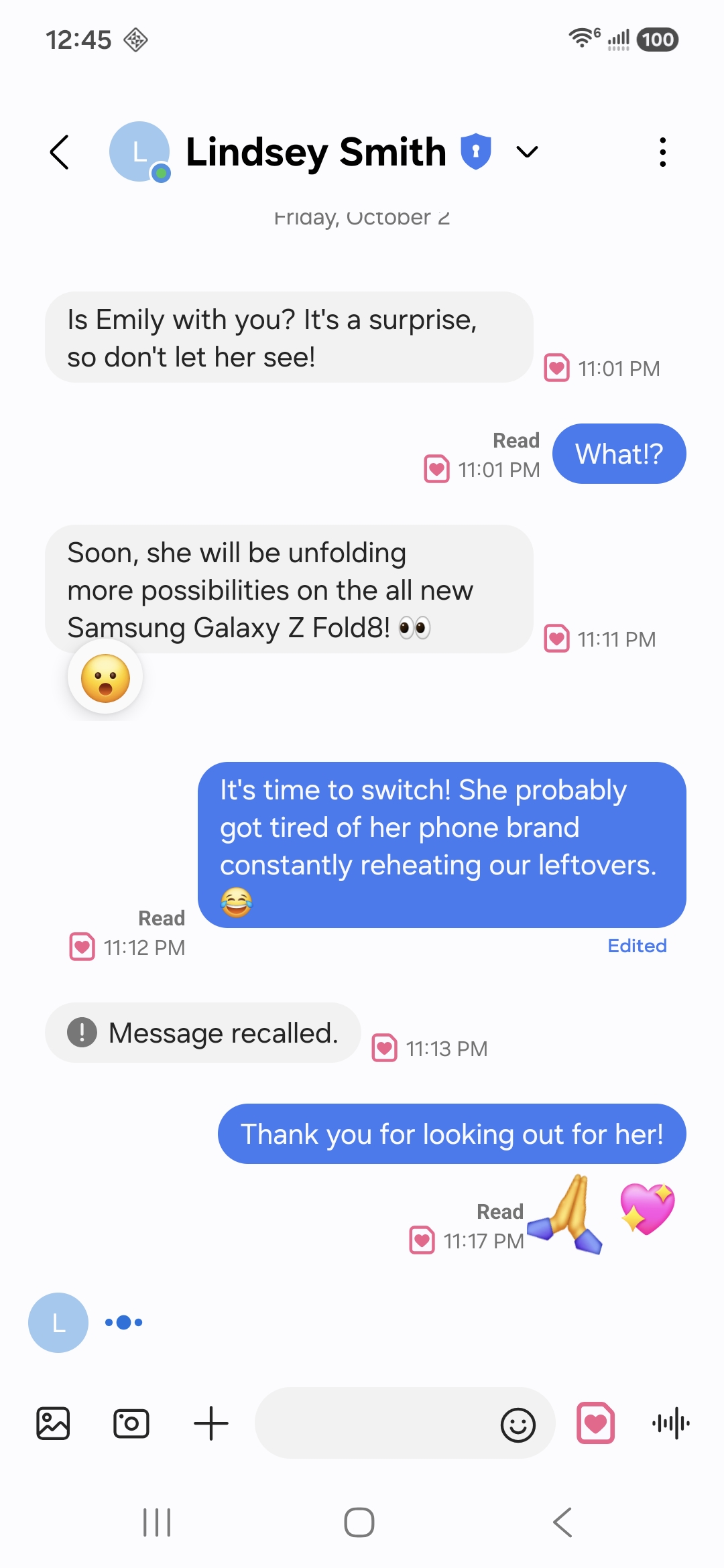 An end-to-end encrypted chat with blue bubbles, a reaction and a read receipt